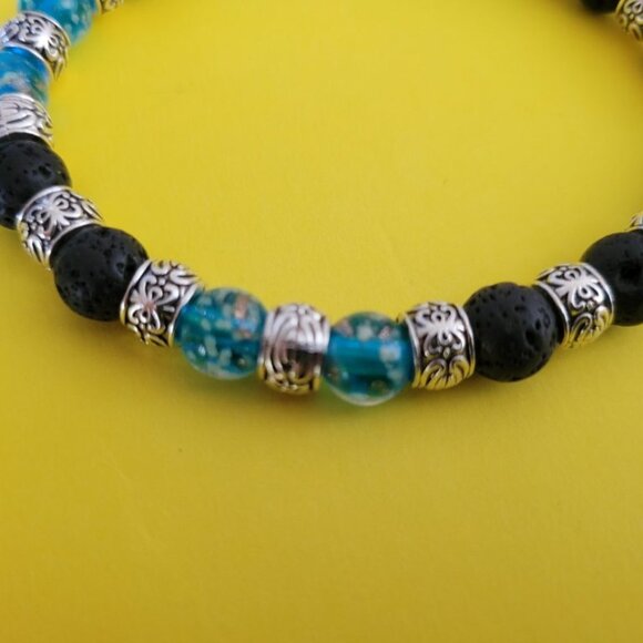 NWT Mens Glow In The Dark Stretch Bracelet. Black Lava Rock Blue Firefly Glass - Picture 3 of 11